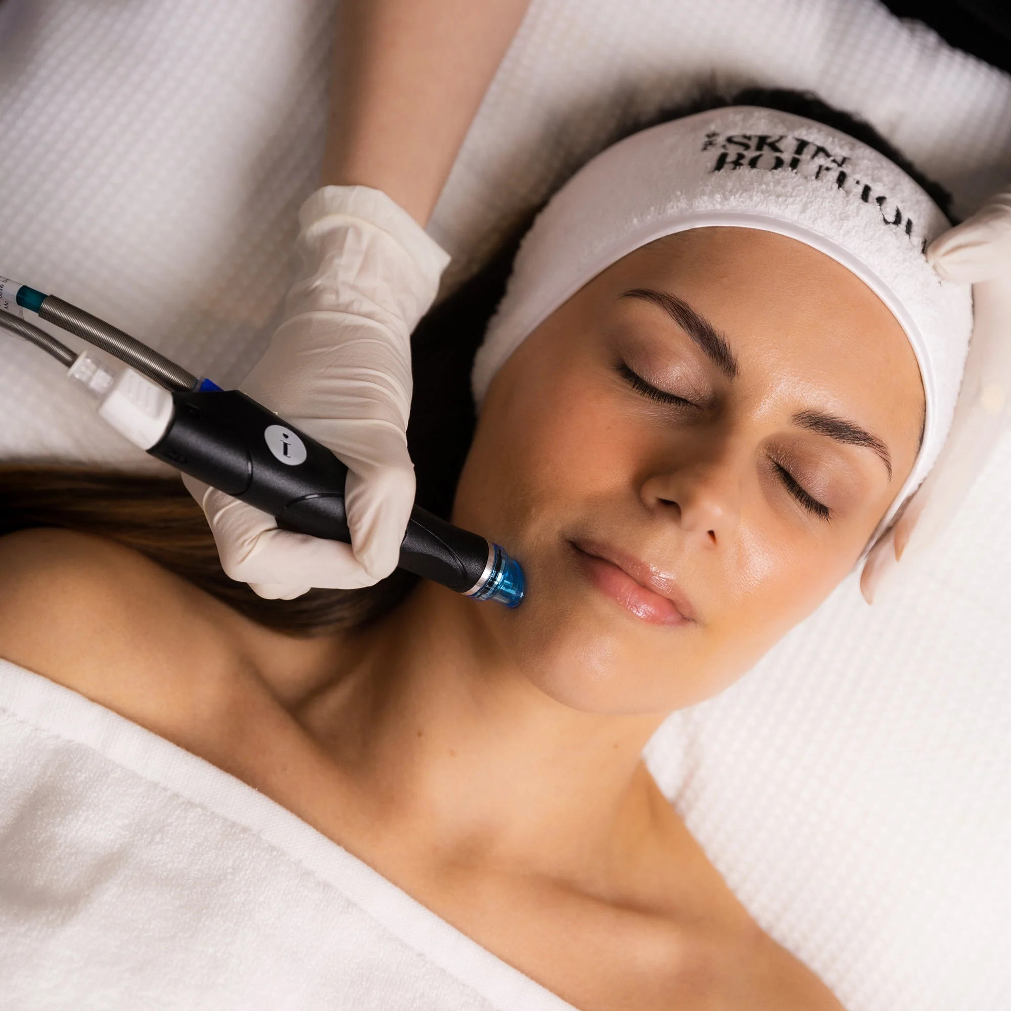 Client receiving HydraFacial treatment